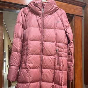Rose colored North face down knee length coat